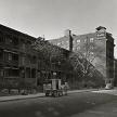 Title:  Three-Decker Houses, 11th Street Between Sixth and Seventh Avenues, Manhattan 
Artist: Berenice Abbott