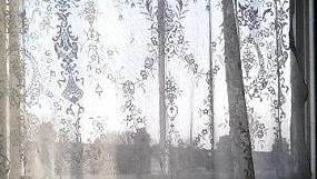 A Pair of vintage Laura Ashley? net curtains