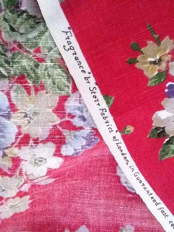 vintage curtains blue and yellow roses on red background